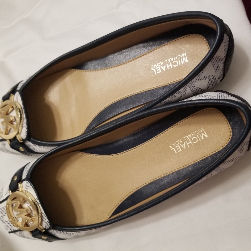White and navy flats